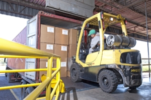Transporte seguro de cargas e tema de folder Divulgação